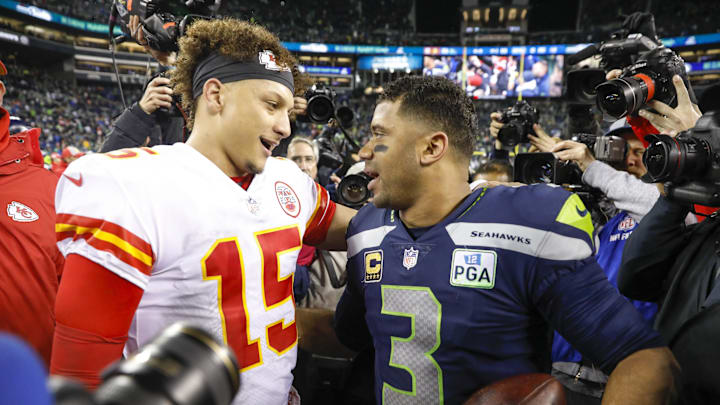 Dec 23, 2018; Seattle, WA, USA; Kansas City Chiefs quarterback Patrick Mahomes (15) greets Seattle Seahawks quarterback Russell Wilson (3) following a 38-31 Seattle victory at CenturyLink Field. Mandatory Credit: Joe Nicholson-Imagn Images