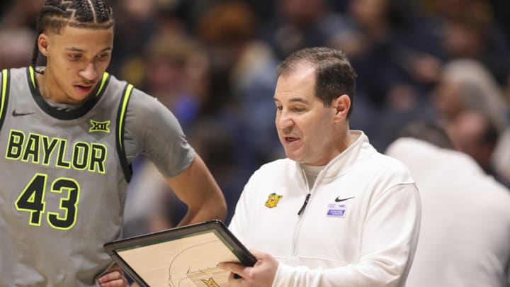 Jan 31, 2026; Morgantown, West Virginia, USA; Baylor Bears head coach Scott Drew talks to Baylor Bears guard Cameron Carr (43) during the second half against the West Virginia Mountaineers at Hope Coliseum. Mandatory Credit: Ben Queen-Imagn Images