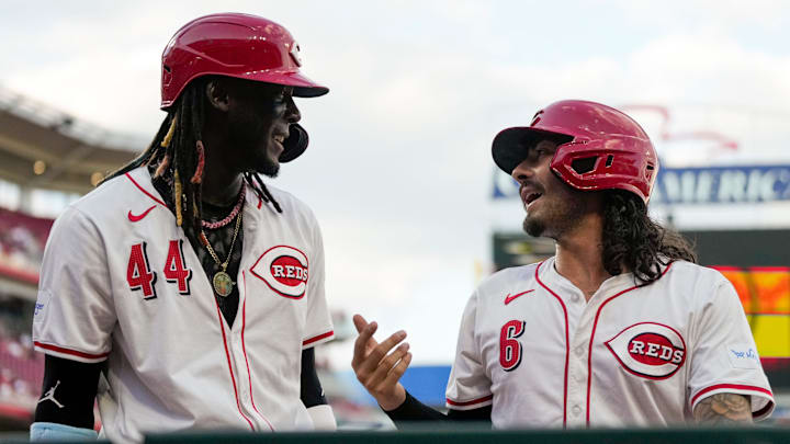 Cincinnati Reds shortstop Elly De La Cruz (44) and second base Jonathan India (6) chat as they return to the dugout after scoring on a Spencer Steer double in the fourth inning of the MLB National League game between the Cincinnati Reds and the Pittsburgh Pirates at Great American Ball Park on Monday, June 24, 2024. Cincinnati Reds shortstop Elly De La Cruz (44) and second base Jonathan India (6) chat as they return to the dugout after scoring on a Spencer Steer double in the fourth inning of the MLB National League game between the Cincinnati Reds and the Pittsburgh Pirates at Great American Ball Park on Monday, June 24, 2024.