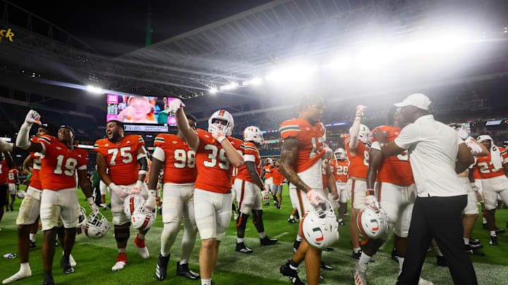 Sep 27, 2024; Miami Gardens, Florida, USA; Miami Hurricanes linebacker Casey Rizzi (39) celebrates with teammates after the game against the Virginia Tech Hokies at Hard Rock Stadium. Mandatory Credit: Sam Navarro-Imagn Images