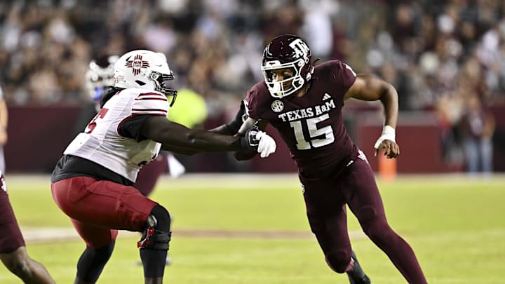 Nov 16, 2024; College Station, Texas, USA; Texas A&M Aggies defensive lineman Rylan Kennedy (15) runs around the edge against the New Mexico State Aggies during the first half at Kyle Field. Mandatory Credit: Maria Lysaker-Imagn Images Nov 16, 2024; College Station, Texas, USA; Texas A&M Aggies defensive lineman Rylan Kennedy (15) runs around the edge against the New Mexico State Aggies during the first half at Kyle Field. Mandatory Credit: Maria Lysaker-Imagn Images