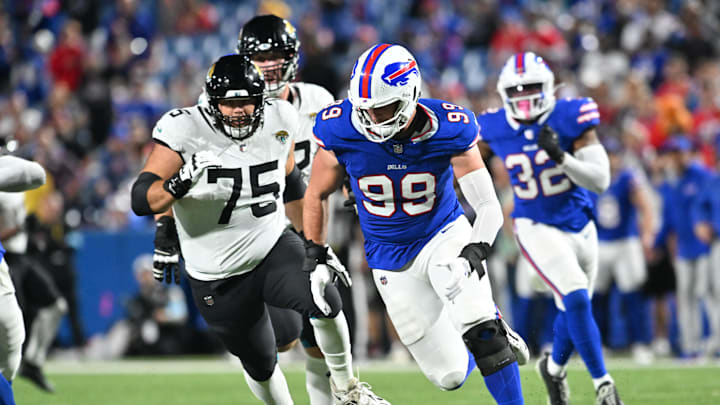 Sep 23, 2024; Orchard Park, New York, USA; Buffalo Bills defensive end Casey Toohill (99) recovers a fumble by the Jacksonville Jaguars