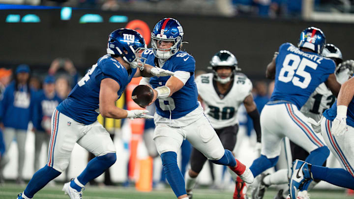New York Giants quarterback Jaxson Dart (6) hands the ball off to New York Giants running back Cam Skattebo (44) during a Thursday Night Football game between the New York Giants and the Philadelphia Eagles at MetLife Stadium in East Rutherford on Oct. 9, 2025. New York Giants quarterback Jaxson Dart (6) hands the ball off to New York Giants running back Cam Skattebo (44) during a Thursday Night Football game between the New York Giants and the Philadelphia Eagles at MetLife Stadium in East Rutherford on Oct. 9, 2025.