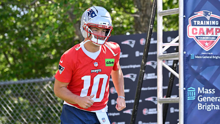 Jul 23, 2025; Foxborough, MA, USA; New England Patriots quarterback Drake Maye (10) jogs to the practice field for training camp at Gillette Stadium. Mandatory Credit: Eric Canha-Imagn Images