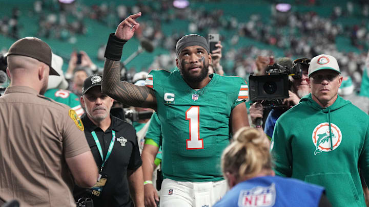 Miami Dolphins quarterback Tua Tagovailoa (1) walks off the field following a victory over Dallas