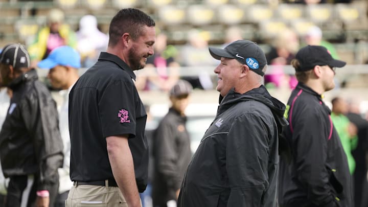Oct 22, 2022; Eugene, Oregon, USA; Oregon Ducks head coach Dan Lanning, left, visits with UCLA.