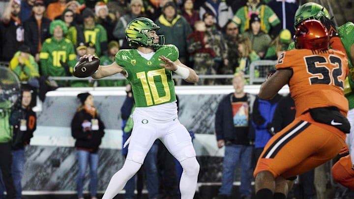 Nov 24, 2023; Eugene, Oregon, USA; Oregon Ducks quarterback Bo Nix (10) throws a pass during the