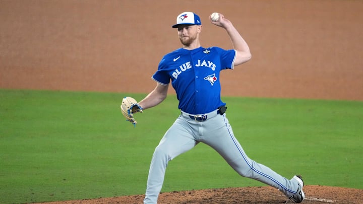 Oct 27, 2025; Los Angeles, California, USA; Toronto Blue Jays pitcher Eric Lauer (56) throws during the twelfth inning  against the Los Angeles Dodgers in game three of the 2025 MLB World Series at Dodger Stadium. Mandatory Credit: Kirby Lee-Imagn Images