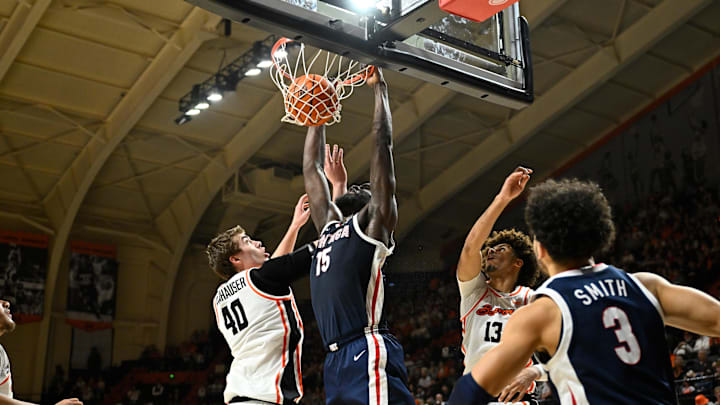 Gonzaga Bulldogs forward Graham Ike (15) dunks the ball over Oregon State Beavers center Noah Amenhauser (40) during the first half at Gill Coliseum.
