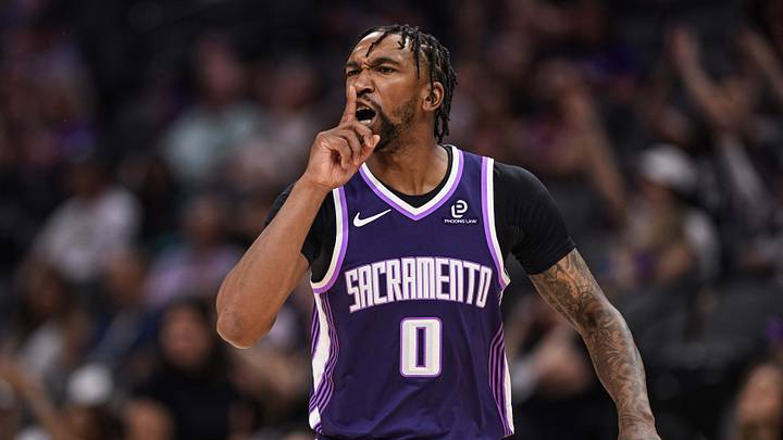 Mar 22, 2026; Sacramento, California, USA; Sacramento Kings guard Malik Monk (0) reacts after a three point basket during the first quarter against the Brooklyn Nets at Golden 1 Center.