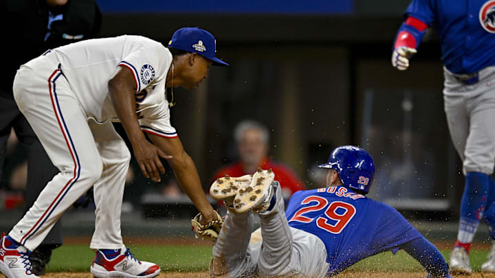 Mar 31, 2024; Arlington, Texas, USA; Chicago Cubs first baseman Michael Busch (29) scores the go