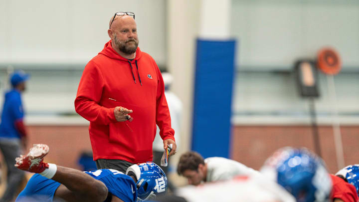 New York Giants head coach Brian Daboll watches his players warm up during Mandatory Minicamp at Quest Diagnostics Giants Training Center in East Rutherford on Tuesday, June 17, 2025.