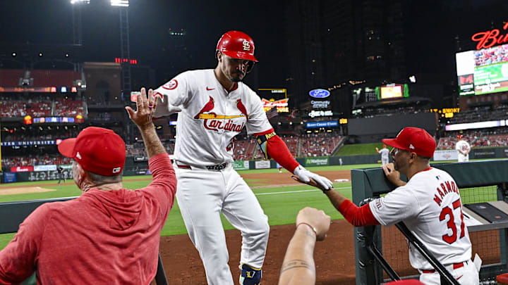 St. Louis Cardinals third baseman Nolan Arenado (28) is congratulated by teammates after hitting a solo home run against the Cincinnati Reds during the fourth inning at Busch Stadium in 2024. St. Louis Cardinals third baseman Nolan Arenado (28) is congratulated by teammates after hitting a solo home run against the Cincinnati Reds during the fourth inning at Busch Stadium in 2024.