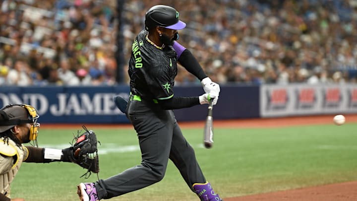 Tampa Bay Rays third baseman Junior Caminero (13) hits a three run home run against the San Diego Padres in the second inning at Tropicana Field. Tampa Bay Rays third baseman Junior Caminero (13) hits a three run home run against the San Diego Padres in the second inning at Tropicana Field.