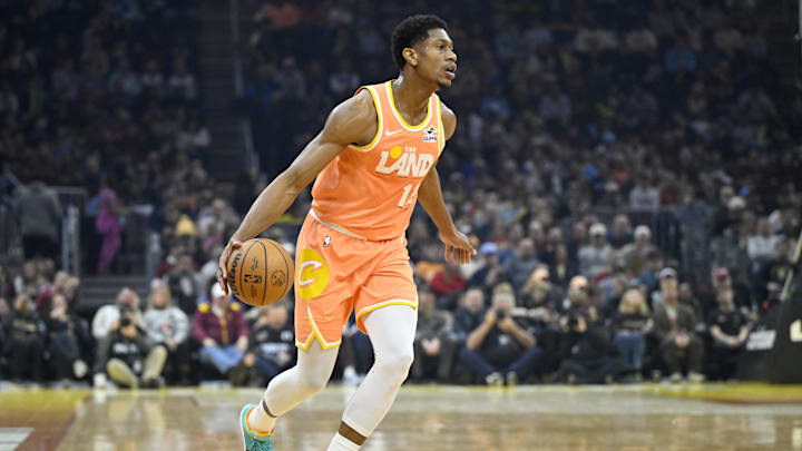 Dec 22, 2025; Cleveland, Ohio, USA; Cleveland Cavaliers forward De'Andre Hunter (12) dribbles the ball in the first quarter against the Charlotte Hornets at Rocket Arena. 
