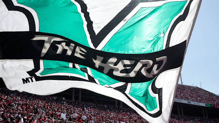 Sept. 21, 2024; Columbus, Ohio, USA;
A large flag is waved for the Marshall Thundering Herd before an NCAA Division I football game against the Ohio State Buckeyes at Ohio Stadium on Saturday. Sept. 21, 2024; Columbus, Ohio, USA;
A large flag is waved for the Marshall Thundering Herd before an NCAA Division I football game against the Ohio State Buckeyes at Ohio Stadium on Saturday.
