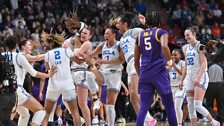 Mar 30, 2025; Spokane, WA, USA; UCLA Bruins begin to celebrate after a Elite 8 NCAA Tournament basketball game against the LSU Lady Tigers at Spokane Arena. Mandatory Credit: James Snook-Imagn Images