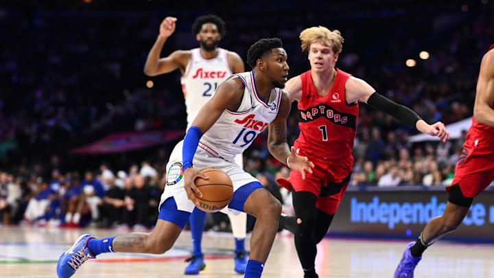 Feb 11, 2025; Philadelphia, Pennsylvania, USA; Philadelphia 76ers forward Justin Edwards (19) drives against Toronto Raptors guard Gradey Dick (1) in the second quarter at Wells Fargo Center. Mandatory Credit: Kyle Ross-Imagn Images Feb 11, 2025; Philadelphia, Pennsylvania, USA; Philadelphia 76ers forward Justin Edwards (19) drives against Toronto Raptors guard Gradey Dick (1) in the second quarter at Wells Fargo Center. Mandatory Credit: Kyle Ross-Imagn Images
