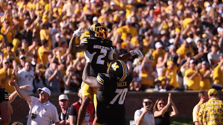 Oct 3, 2026; Columbia, Missouri, USA; Missouri Tigers wide receiver Caleb Goodie (2) celebrates a touchdown with offensive line Cayden Green (70) in the second quarter against the Florida Gators at Faurot Field at Memorial Stadium. Mandatory Credit: William Purnell-Imagn Images Oct 3, 2026; Columbia, Missouri, USA; Missouri Tigers wide receiver Caleb Goodie (2) celebrates a touchdown with offensive line Cayden Green (70) in the second quarter against the Florida Gators at Faurot Field at Memorial Stadium. Mandatory Credit: William Purnell-Imagn Images