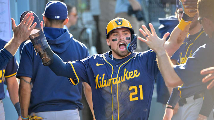 Oct 16, 2025; Los Angeles, California, USA; Milwaukee Brewers third baseman Caleb Durbin (21) celebrates in the dugout after scoring against the Los Angeles Dodgers in the second inning during game three of the NLCS round for the 2025 MLB playoffs at Dodger Stadium. Mandatory Credit: Jayne Kamin-Oncea-Imagn Images Oct 16, 2025; Los Angeles, California, USA; Milwaukee Brewers third baseman Caleb Durbin (21) celebrates in the dugout after scoring against the Los Angeles Dodgers in the second inning during game three of the NLCS round for the 2025 MLB playoffs at Dodger Stadium. Mandatory Credit: Jayne Kamin-Oncea-Imagn Images