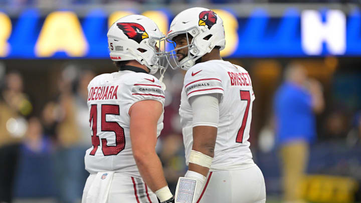 Jan 4, 2026; Inglewood, California, USA; Arizona Cardinals tight end Josiah Deguara (45) reacts with quarterback Jacoby Brissett (7) after a touchdown catch against the Los Angeles Rams during the second half at SoFi Stadium. Jan 4, 2026; Inglewood, California, USA; Arizona Cardinals tight end Josiah Deguara (45) reacts with quarterback Jacoby Brissett (7) after a touchdown catch against the Los Angeles Rams during the second half at SoFi Stadium.