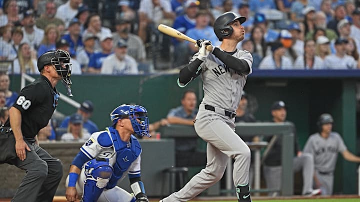 Jun 10, 2025; Kansas City, Missouri, USA;  New York Yankees right fielder Cody Bellinger (35) singles in a run in the sixth inning against the Kansas City Royals at Kauffman Stadium. Mandatory Credit: Peter Aiken-Imagn Images