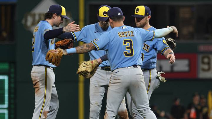 Sep 16, 2026; Pittsburgh, Pennsylvania, USA; Milwaukee Brewers second baseman Brice Turang (2) and shortstop Cooper Pratt (center) and third baseman Joey Ortiz (3) and first baseman Jake Bauers (right) celebrate after defeating the Pittsburgh Pirates at PNC Park. Mandatory Credit: Charles LeClaire-Imagn Images Sep 16, 2026; Pittsburgh, Pennsylvania, USA; Milwaukee Brewers second baseman Brice Turang (2) and shortstop Cooper Pratt (center) and third baseman Joey Ortiz (3) and first baseman Jake Bauers (right) celebrate after defeating the Pittsburgh Pirates at PNC Park. Mandatory Credit: Charles LeClaire-Imagn Images