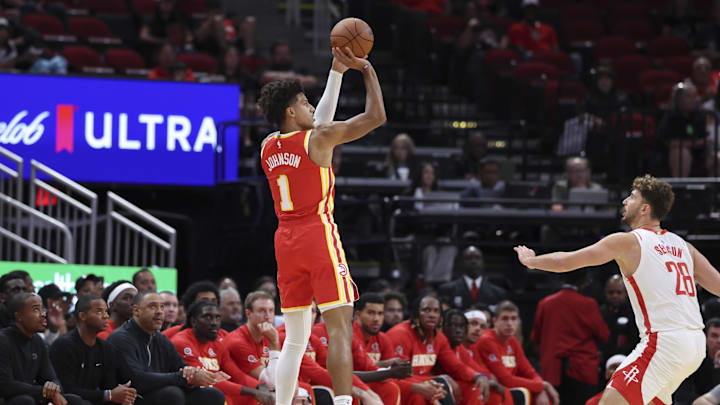 Oct 6, 2025; Houston, Texas, USA; Atlanta Hawks forward Jalen Johnson (1) shoots the ball as Houston Rockets center Alperen Sengun (28) defends during the first quarter at Toyota Center. Mandatory Credit: Troy Taormina-Imagn Images Oct 6, 2025; Houston, Texas, USA; Atlanta Hawks forward Jalen Johnson (1) shoots the ball as Houston Rockets center Alperen Sengun (28) defends during the first quarter at Toyota Center. Mandatory Credit: Troy Taormina-Imagn Images