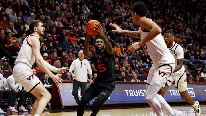 Jan 13, 2024; Blacksburg, Virginia, USA; Miami Hurricanes guard Wooga Poplar (5) drives to the