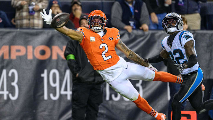 Nov 9, 2023; Chicago, Illinois, USA; Chicago Bears wide receiver D.J. Moore (2) cannot make a diving catch against the Carolina Panthers during the first quarter at Soldier Field. Mandatory Credit: Daniel Bartel-Imagn Images