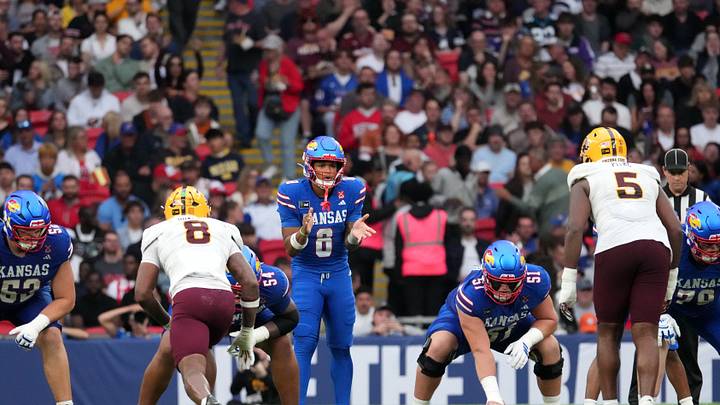 Sep 19, 2026; London, ENG; Kansas Jayhawks quarterback Isaiah Marshall (8) prepares for the snap during the first half against the Arizona State Sun Devils at Wembley Stadium. Mandatory Credit: Peter van den Berg-Imagn Images Sep 19, 2026; London, ENG; Kansas Jayhawks quarterback Isaiah Marshall (8) prepares for the snap during the first half against the Arizona State Sun Devils at Wembley Stadium. Mandatory Credit: Peter van den Berg-Imagn Images