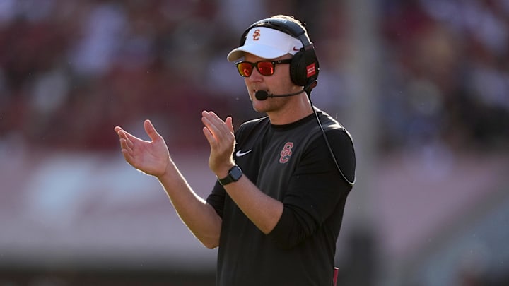 Aug 30, 2025; Los Angeles, California, USA; Southern California Trojans head coach Lincoln Riley watches from the sidelines against the Missouri State Bears in the first half at United Airlines Field at Los Angeles Memorial Coliseum. Mandatory Credit: Kirby Lee-Imagn Images Aug 30, 2025; Los Angeles, California, USA; Southern California Trojans head coach Lincoln Riley watches from the sidelines against the Missouri State Bears in the first half at United Airlines Field at Los Angeles Memorial Coliseum. Mandatory Credit: Kirby Lee-Imagn Images