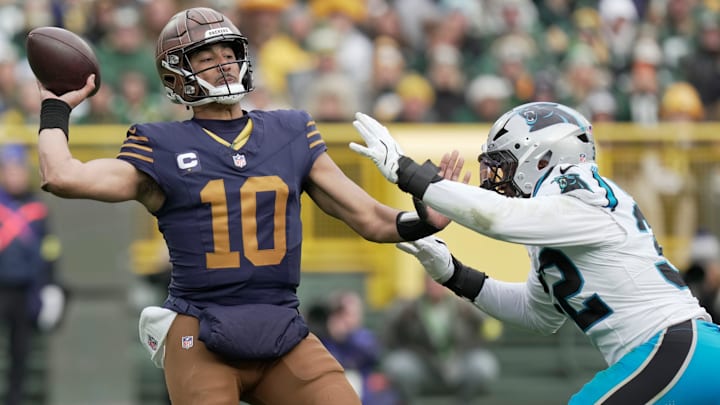 Green Bay Packers quarterback Jordan Love is pressed by Carolina Panthers linebacker Trevin Wallace (32) during the third quarter of their game Sunday, November 2, 2025 at Lambeau Field in Green Bay, Wisconsin. Green Bay Packers quarterback Jordan Love is pressed by Carolina Panthers linebacker Trevin Wallace (32) during the third quarter of their game Sunday, November 2, 2025 at Lambeau Field in Green Bay, Wisconsin.