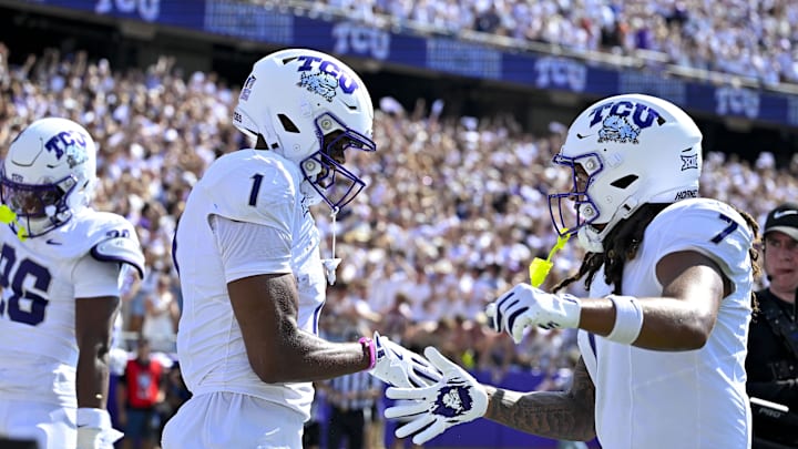 Sep 20, 2025; Fort Worth, Texas, USA; TCU Horned Frogs wide receiver Eric McAlister (1) and wide receiver Jordan Dwyer (7) celebrate after McAlister scores a touchdown against the SMU Mustangs during the first half at Amon G. Carter Stadium. Mandatory Credit: Jerome Miron-Imagn Images Sep 20, 2025; Fort Worth, Texas, USA; TCU Horned Frogs wide receiver Eric McAlister (1) and wide receiver Jordan Dwyer (7) celebrate after McAlister scores a touchdown against the SMU Mustangs during the first half at Amon G. Carter Stadium. Mandatory Credit: Jerome Miron-Imagn Images