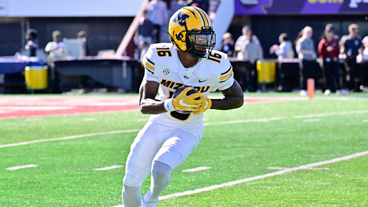 Oct 12, 2024; Amherst, Massachusetts, USA; Missouri Tigers wide receiver Daniel Blood (16)  makes a catch against the Massachusetts Minutemen during the second half at Warren McGuirk Alumni Stadium. Mandatory Credit: Eric Canha-Imagn Images