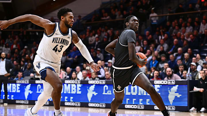 Nov 29, 2023; Villanova, Pennsylvania, USA; Saint Joseph's Hawks forward Rasheer Fleming (13) drives against Villanova Wildcats forward Eric Dixon (43) in the second half at William B. Finneran Pavilion. Mandatory Credit: Kyle Ross-Imagn Images Nov 29, 2023; Villanova, Pennsylvania, USA; Saint Joseph's Hawks forward Rasheer Fleming (13) drives against Villanova Wildcats forward Eric Dixon (43) in the second half at William B. Finneran Pavilion. Mandatory Credit: Kyle Ross-Imagn Images