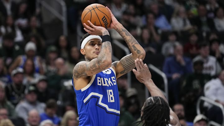 Mar 15, 2025; Milwaukee, Wisconsin, USA; Milwaukee Bucks forward Kyle Kuzma (18) shoots over Indiana Pacers forward Aaron Nesmith (23) during the third quarter at Fiserv Forum. Mandatory Credit: Jeff Hanisch-Imagn Images Mar 15, 2025; Milwaukee, Wisconsin, USA; Milwaukee Bucks forward Kyle Kuzma (18) shoots over Indiana Pacers forward Aaron Nesmith (23) during the third quarter at Fiserv Forum. Mandatory Credit: Jeff Hanisch-Imagn Images