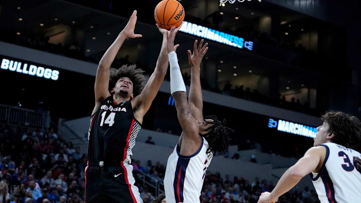 Mar 20, 2025; Wichita, KS, USA; Georgia Bulldogs forward Asa Newell (14) shoots against Gonzaga Bulldogs guard Michael Ajayi (1) in the first half of a first round men’s NCAA Tournament game at Intrust Bank Arena. Mandatory Credit: Kirby Lee-Imagn Images Mar 20, 2025; Wichita, KS, USA; Georgia Bulldogs forward Asa Newell (14) shoots against Gonzaga Bulldogs guard Michael Ajayi (1) in the first half of a first round men’s NCAA Tournament game at Intrust Bank Arena. Mandatory Credit: Kirby Lee-Imagn Images