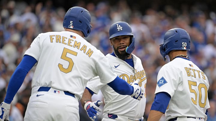 Mar 27, 2025; Los Angeles, California, USA; Los Angeles Dodgers outfielder Teoscar Hernandez (37) reacts with shortstop Mookie Betts (50) and first base Freddie Freeman (5) after hitting a three run home run against the Detroit Tigers during the fifth inning at Dodger Stadium. Mandatory Credit: Jayne Kamin-Oncea-Imagn Images