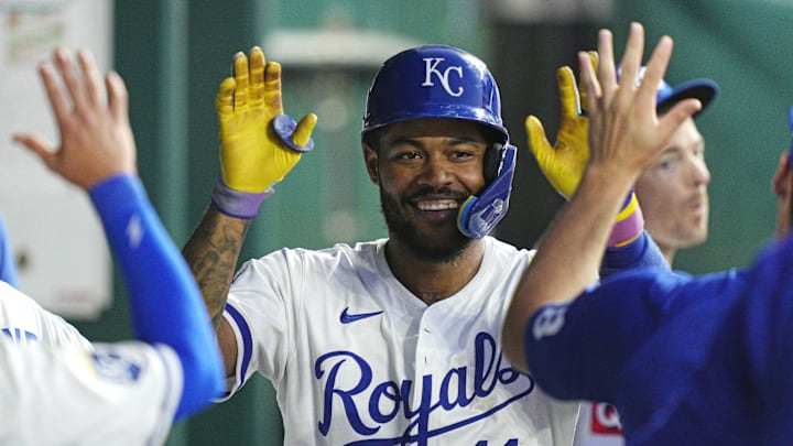 Aug 18, 2025; Kansas City, Missouri, USA; Kansas City Royals third baseman Maikel Garcia (11) is congratulated by teammates after hitting a home run during the fifth inning against the Texas Rangers at Kauffman Stadium. Mandatory Credit: Jay Biggerstaff-Imagn Images