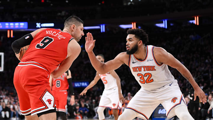 Nov 13, 2024; New York, New York, USA; Chicago Bulls center Nikola Vucevic (9) looks for an opening as New York Knicks center Karl-Anthony Towns (32) defends during the second half at Madison Square Garden. Mandatory Credit: John Jones-Imagn Images