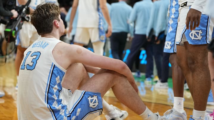 Mar 19, 2026; Greenville, SC, USA; North Carolina Tar Heels center Henri Veesaar (13) reacts after losing to the VCU Rams in overtime of a first round game of the men's 2026 NCAA Tournament at Bon Secours Wellness Arena. Mandatory Credit: Bob Donnan-Imagn Images