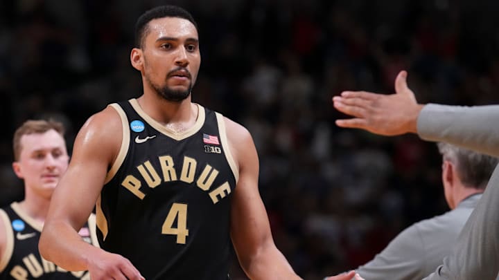 Purdue Boilermakers forward Trey Kaufman-Renn (4) leaves the court as the seconds count down vs. Arizona.