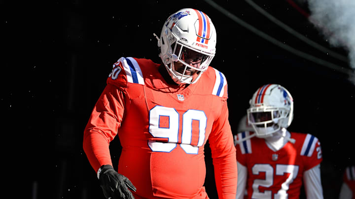 Dec 1, 2024; Foxborough, Massachusetts, USA; New England Patriots defensive tackle Christian Barmore (90) walks out of the player's tunnel before a game against the Indianapolis Colts at Gillette Stadium. Mandatory Credit: Eric Canha-Imagn Images