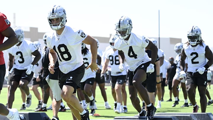 Jun 10, 2025; Henderson, NV, USA; Las Vegas Raiders wide receiver Jack Bech (18) and wide receiver Shedrick Jackson (4) perform a drill during Las Vegas Raiders Minicamp at Intermountain Health Performance Center. Mandatory Credit: Candice Ward-Imagn Images