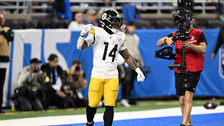 Dec 21, 2025; Detroit, Michigan, USA; Pittsburgh Steelers running back Kenneth Gainwell (14) celebrates after a touchdown during the third quarter against the Detroit Lions at Ford Field. Mandatory Credit: Lon Horwedel-Imagn Images