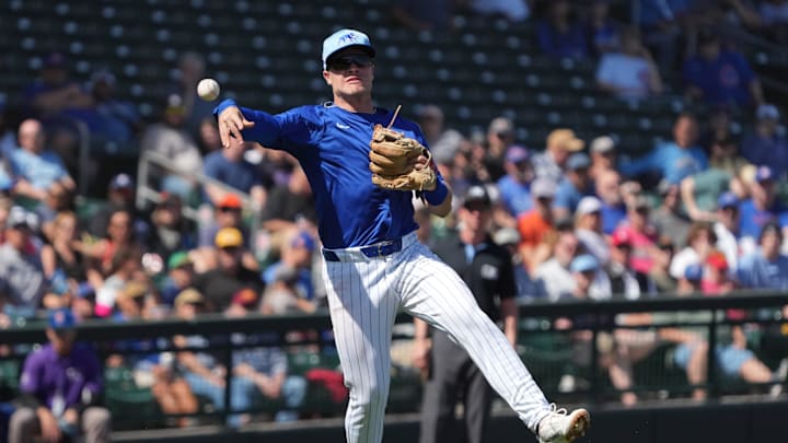 Chicago Cubs third baseman Matt Shaw makes the off balance throw for an out against the San Diego Padres in the second inning at Sloan Park on March 4.