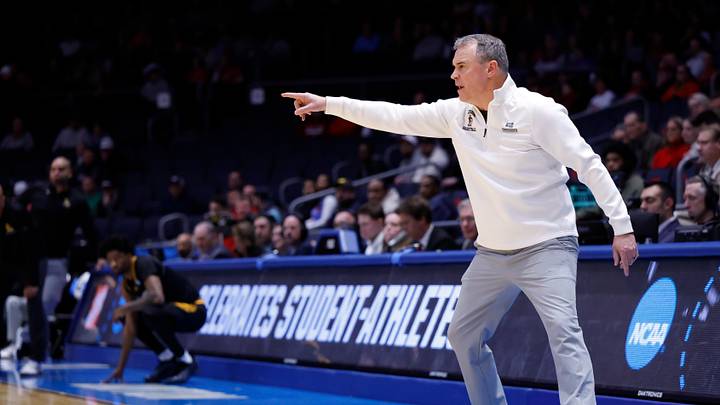 Mar 18, 2026; Dayton, OH, USA; Lehigh Mountain Hawks head coach Brett Reed coaches in the first half against the Prairie View A&M Panthers during a first four game of the men's 2026 NCAA Tournament at University of Dayton Arena. Mandatory Credit: Rick Osentoski-Imagn Images