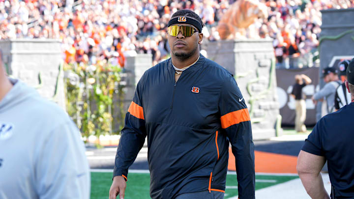 Orlando Brown Jr. walks on the field as he misses the game with an injury in the first quarter of the NFL Week 9 game between the Cincinnati Bengals and the Las Vegas Raiders at Paycor Stadium in downtown Cincinnati on Sunday, Nov. 3, 2024.