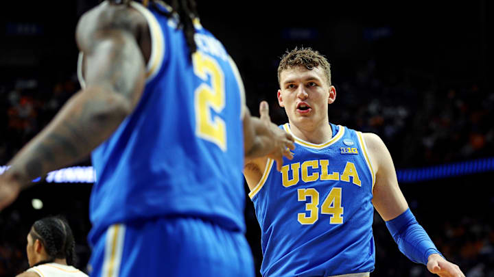 Mar 22, 2025; Lexington, KY, USA; UCLA Bruins forward Tyler Bilodeau (34) celebrates with guard Dylan Andrews (2) during the second half against the Tennessee Volunteers in the second round of the NCAA Tournament at Rupp Arena. Mandatory Credit: Jordan Prather-Imagn Images